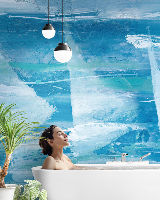 a-woman-relaxing-in-a-bathtub-with-abstract-blue-wallpaper-and-lighting-in-the-bathroom A woman relaxing in a bathtub with abstract blue wallpaper and lighting in the bathroom