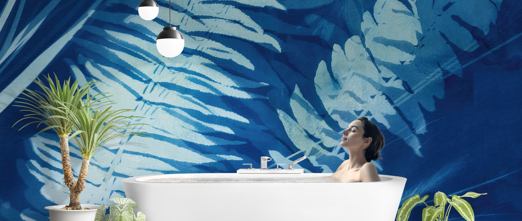 a-woman-relaxing-in-a-bathtub-with-blue-wallpaper-patterns-of-large-tropical-leaves-in-the-background A woman relaxing in a bathtub with blue wallpaper patterns of large tropical leaves in the background