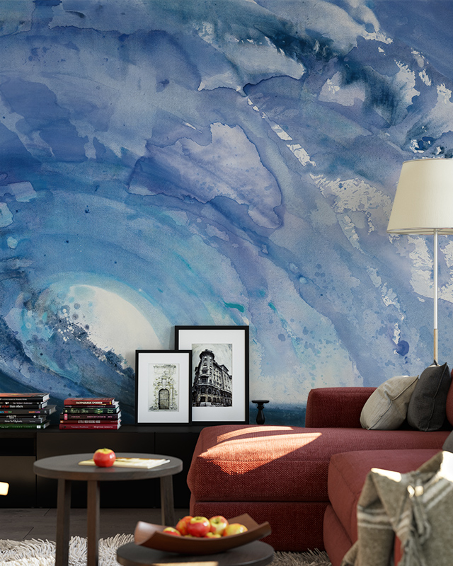 abstract-blue-watercolor-wallpaper-behind-a-red-sofa-framed-art-and-a-modern-lamp-blue-wallpaper-for-commercial-spaces abstract blue watercolor wallpaper behind a red sofa framed art and a modern lamp blue wallpaper for commercial spaces