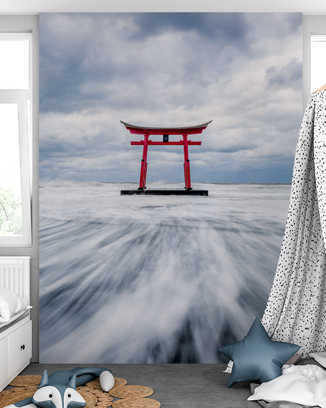 bedroom-with-a-wallpaper-maintenance-of-a-torii-gate-in-the-sea-featuring-ocean-themed-decor-and-blue-bedding Bedroom with a wallpaper maintenance of a torii gate in the sea, featuring ocean-themed decor and blue bedding.
