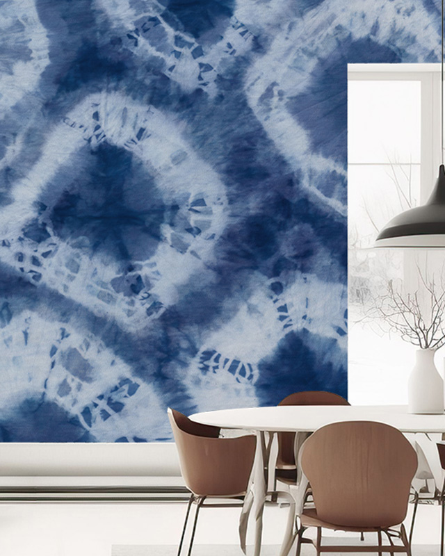 blue-wallpaper-for-commercial-spaces-featuring-a-tie-dye-pattern-with-circular-designs-in-blue-and-white Blue wallpaper for commercial spaces featuring a tie-dye pattern with circular designs in blue and white