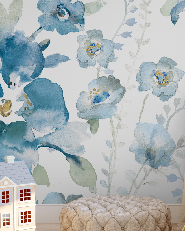 close-up-of-blue-wallpaper-patterns-with-watercolor-style-flowers-featuring-a-small-toy-house-and-ottoman-in-the-foreground Close-up of blue wallpaper patterns with watercolor-style flowers, featuring a small toy house and ottoman in the foreground