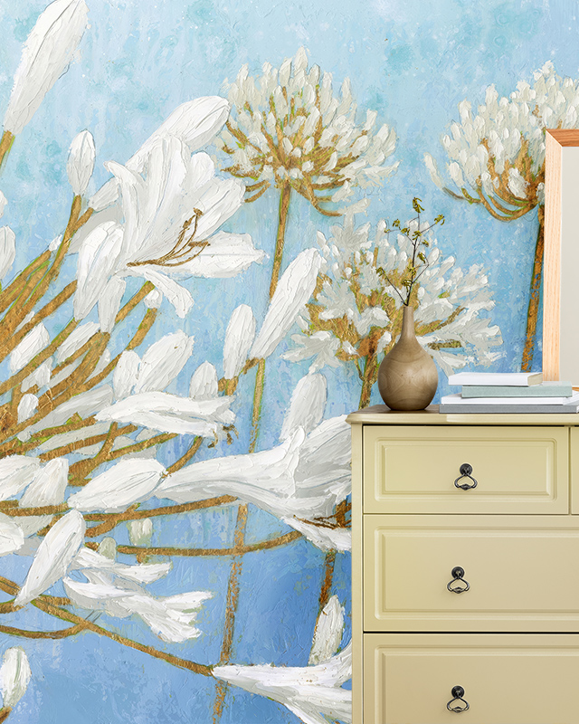 floral-blue-wallpaper-textures-with-white-blossoms-complemented-by-a-yellow-dresser-with-a-small-vase-and-books Floral blue wallpaper textures with white blossoms, complemented by a yellow dresser with a small vase and books