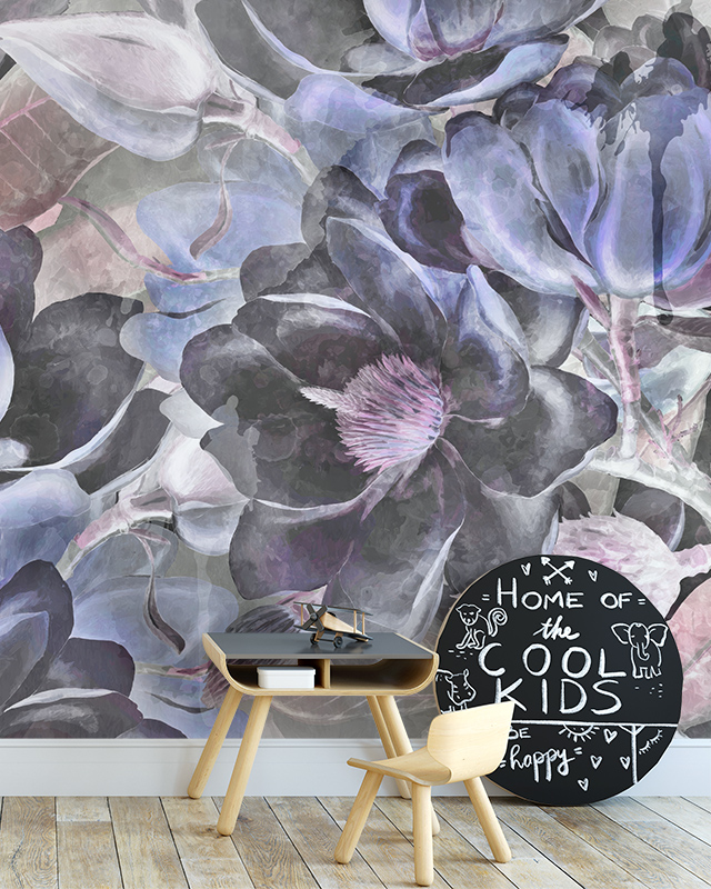 Floral Wallpaper Trend with large abstract flowers in dark purple and gray tones. In front of the wallpaper are a play table, chalkboard, and light wood flooring. Floral Wallpaper Trend with large abstract flowers in dark purple and gray tones. In front of the wallpaper are a play table, chalkboard, and light wood flooring.