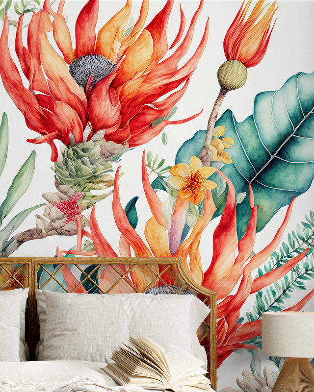 Floral Wallpaper Trend with vibrant red, orange, and green tropical flowers and leaves. In front of the wallpaper is a bed with pillows and an open book. Floral Wallpaper Trend with vibrant red, orange, and green tropical flowers and leaves. In front of the wallpaper is a bed with pillows and an open book.