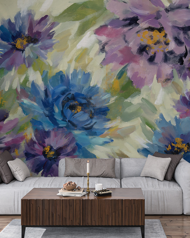 Vibrant-floral-wallpaper-trend-featuring-large-abstract-flowers-in-shades-of-blue-purple-and-pink.-The-living-room-includes-a-modern-gray-sofa-with-pillows-a-wooden-table Vibrant floral wallpaper trend featuring large, abstract flowers in shades of blue, purple, and pink. The living room includes a modern gray sofa with pillows, a wooden table.