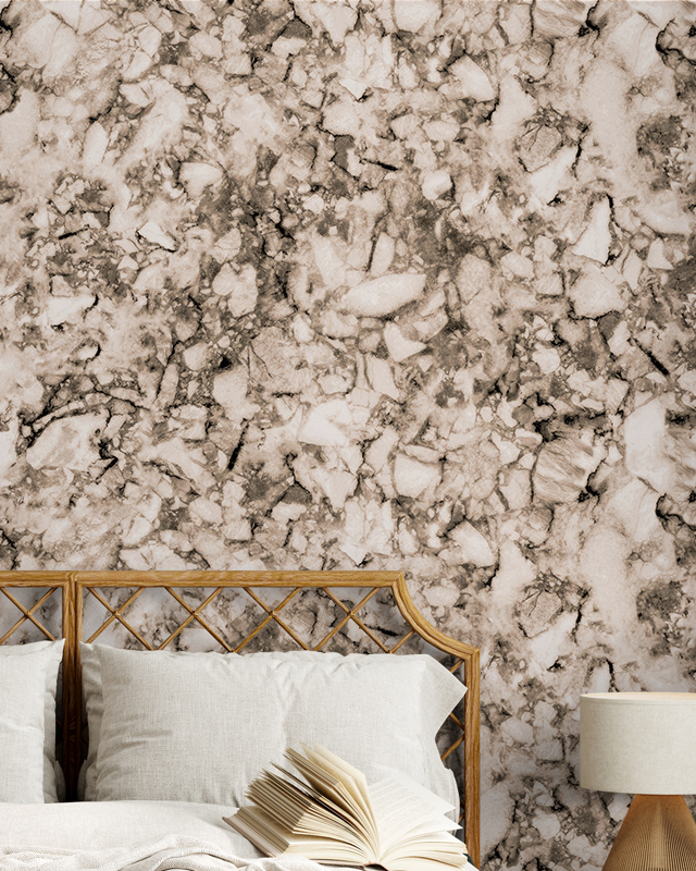 A bedroom featuring Beige Wallpaper for Bathrooms with a marble texture, light bedding, and an open book on the bed.