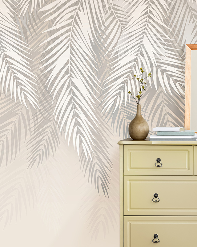 A room featuring Beige Wallpaper for Bathrooms with a tropical palm leaf design, next to a light yellow dresser.