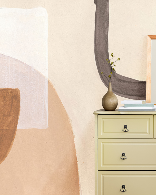 a-room-featuring-beige-wallpaper-for-commercial-spaces-with-an-abstract-design-a-light-yellow-dresser-and-a-vase-in-front A room featuring Beige Wallpaper for Commercial Spaces with an abstract design, a light yellow dresser, and a vase in front.