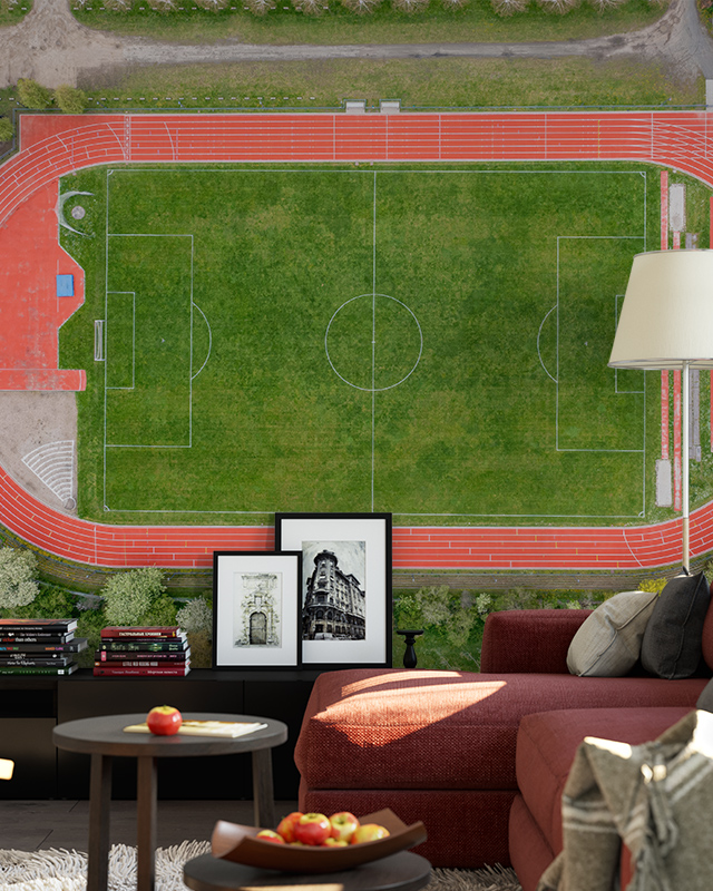 aerial-soccer-field-and-track-wallpaper-in-front-of-a-cozy-living-room-showcasing-types-of-sports-wallpapers Aerial soccer field and track wallpaper in front of a cozy living room, showcasing Types of Sports Wallpapers.