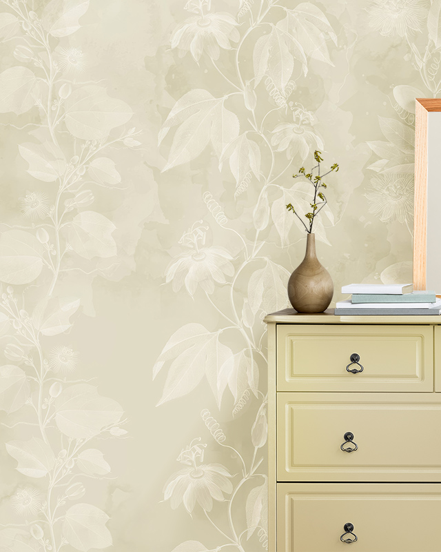 bedroom-with-beige-wallpaper-featuring-a-subtle-floral-pattern-a-cream-colored-dresser-and-a-small-vase-with-a-branch-on-top Bedroom with beige wallpaper featuring a subtle floral pattern, a cream-colored dresser, and a small vase with a branch on top.
