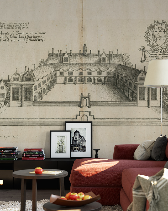 bedroom-with-beige-wallpaper-featuring-a-vintage-architectural-drawing-complemented-by-a-red-sofa-framed-photos-and-a-floor-lamp-in-front Bedroom with beige wallpaper featuring a vintage architectural drawing, complemented by a red sofa, framed photos, and a floor lamp in front.