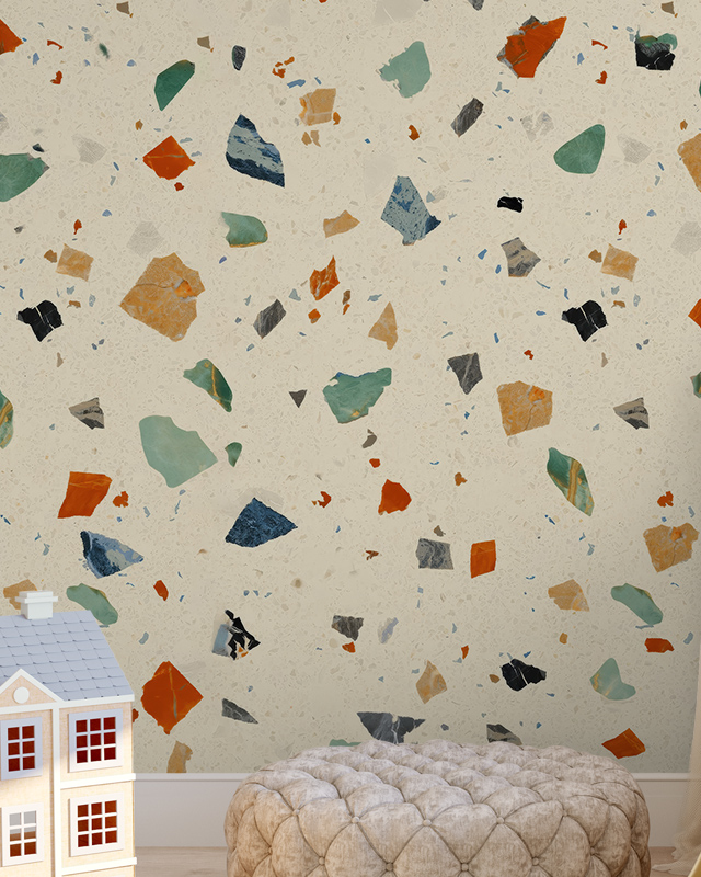 beige-wallpaper-trends-with-colorful-terrazzo-pattern-a-plush-ottoman-and-a-small-toy-house-in-front Beige wallpaper trends with colorful terrazzo pattern, a plush ottoman, and a small toy house in front.