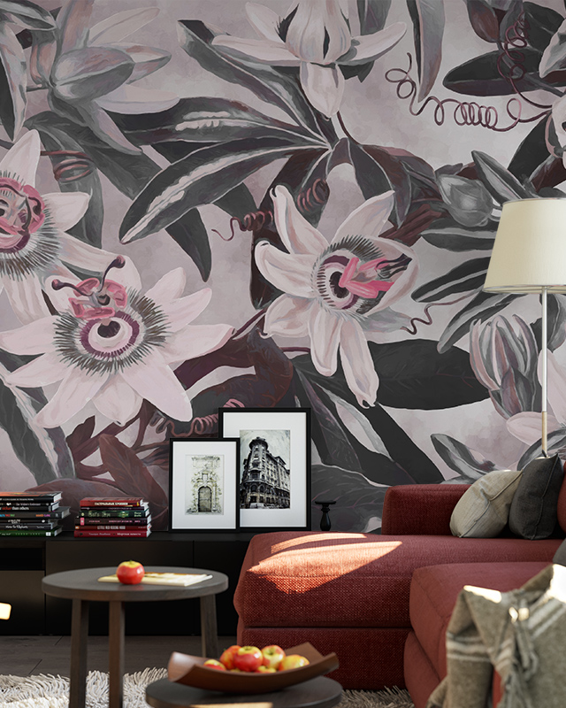 floral-wallpaper-for-accent-walls-with-large-pink-and-gray-flowers-in-front-of-a-cozy-red-sofa-and-framed-art Floral Wallpaper for Accent Walls with large pink and gray flowers in front of a cozy red sofa and framed art.