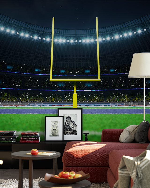 football field wallpaper behind living room sofa demonstrating tips for selecting sports wallpaper.