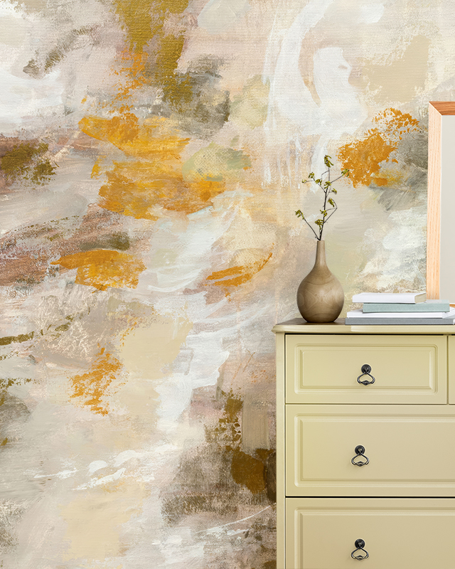 Textured beige wallpaper for bathrooms with warm tones behind a beige dresser, perfect for bathroom decor.