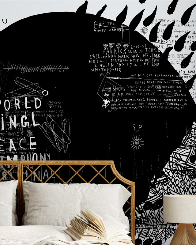 a-black-and-white-mural-with-abstract-designs-and-text-behind-a-wooden-bedframe-showcasing-pros-and-cons-of-removable-wallpaper A black-and-white mural with abstract designs and text behind a wooden bedframe, showcasing Pros and Cons of Removable Wallpaper.