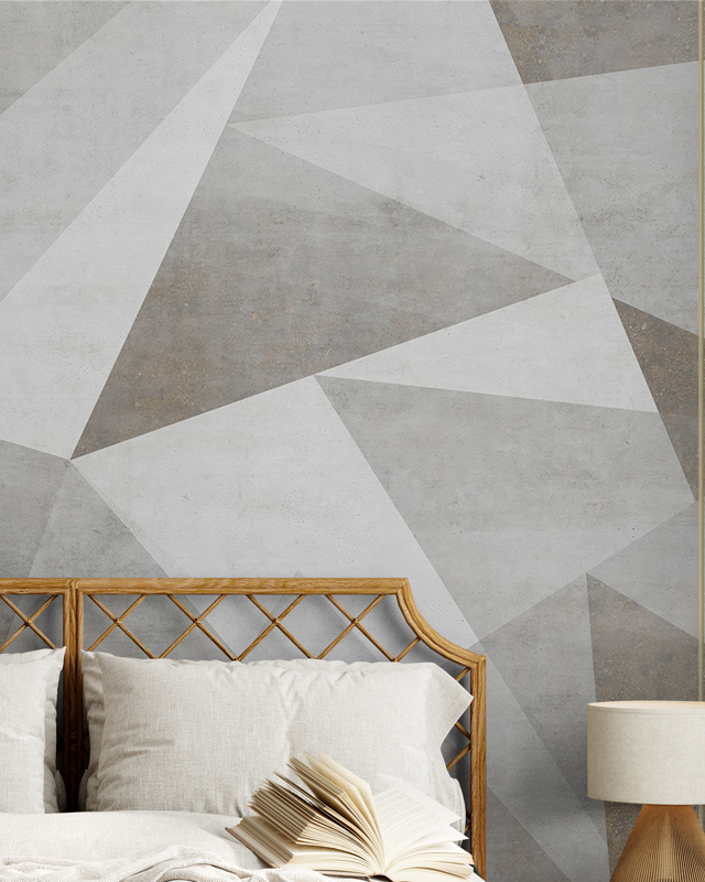 a-geometric-gray-toned-design-on-peel-and-stick-wallpaper-behind-a-bed-highlighting-peel-and-stick-wallpaper-trends A geometric gray-toned design on peel and stick wallpaper behind a bed, highlighting Peel and Stick Wallpaper trends.