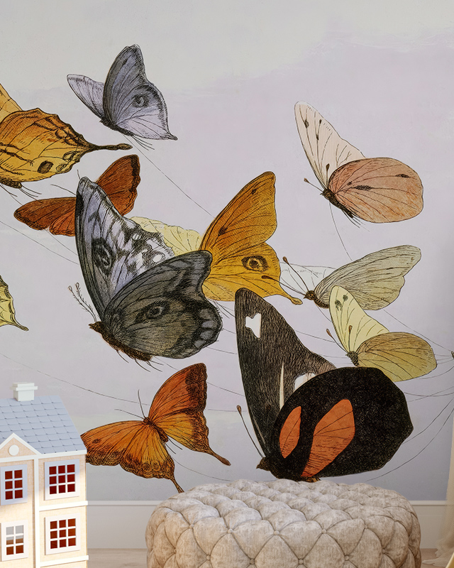 a-nursery-wall-features-colorful-butterflies-a-toy-house-and-a-plush-ottoman-in-front-showcasing-the-pros-and-cons-of-removable-wallpaper A nursery wall features colorful butterflies, a toy house, and a plush ottoman in front, showcasing the pros and cons of removable wallpaper.