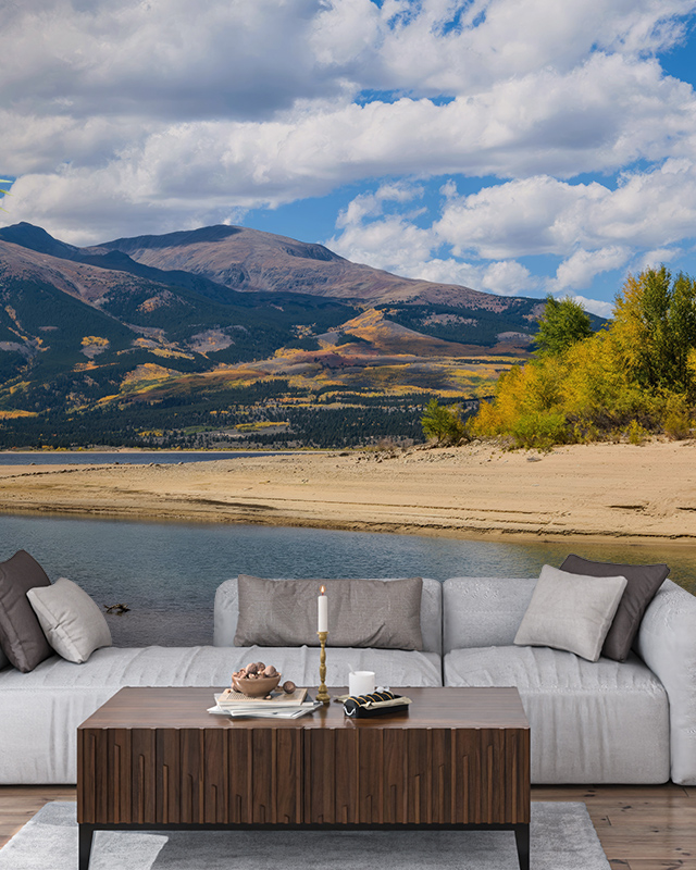 a-serene-lake-and-mountain-landscape-mural-enhances-the-room-offering-calming-wallpaper-for-different-workplaces A serene lake and mountain landscape mural enhances the room, offering calming wallpaper for different workplaces.