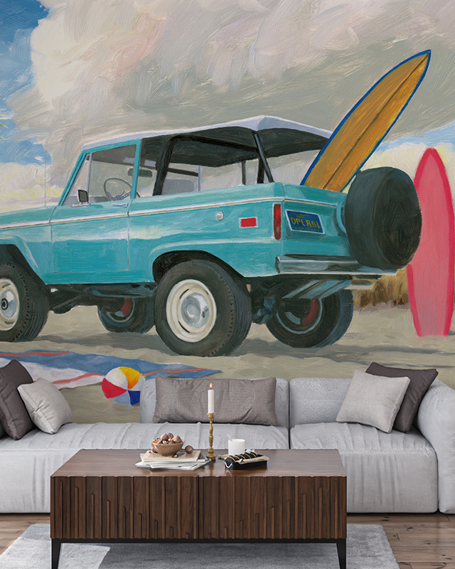 beach-scene-boys-teens-room-wallpaper-featuring-a-vintage-suv-surfboards-and-beach-ball-behind-a-cozy-sofa Beach scene Boys Teens Room wallpaper featuring a vintage SUV, surfboards, and beach ball behind a cozy sofa.