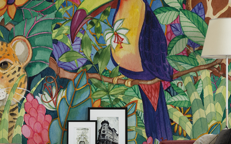 Designing accent walls with teens room wallpaper featuring a vibrant jungle scene with a toucan, leopard, and colorful foliage.