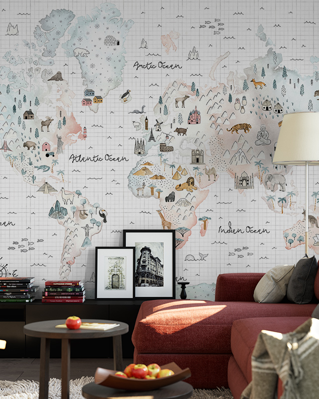 Designing Accent Walls with teens room wallpaper featuring a world map, red sofa, framed pictures, and a cozy table setup.