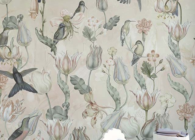 Floral and bird-themed Beige Wallpaper for nursery with soft pastel accents and a small white horse figurine.