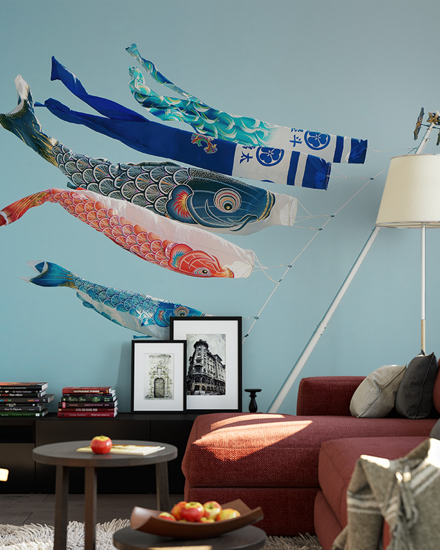 Japandi wallpaper for different spaces featuring colorful koi fish on a serene blue background, styled with modern decor.