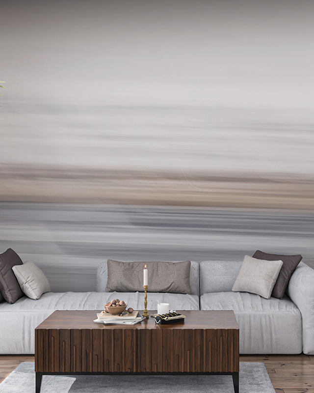 minimalist-gradient-wallpaper-in-soft-grey-and-beige-tones-behind-a-grey-sofa-ideal-wallpaper-for-open-office-layouts Minimalist gradient wallpaper in soft grey and beige tones behind a grey sofa. Ideal wallpaper for open office layouts.