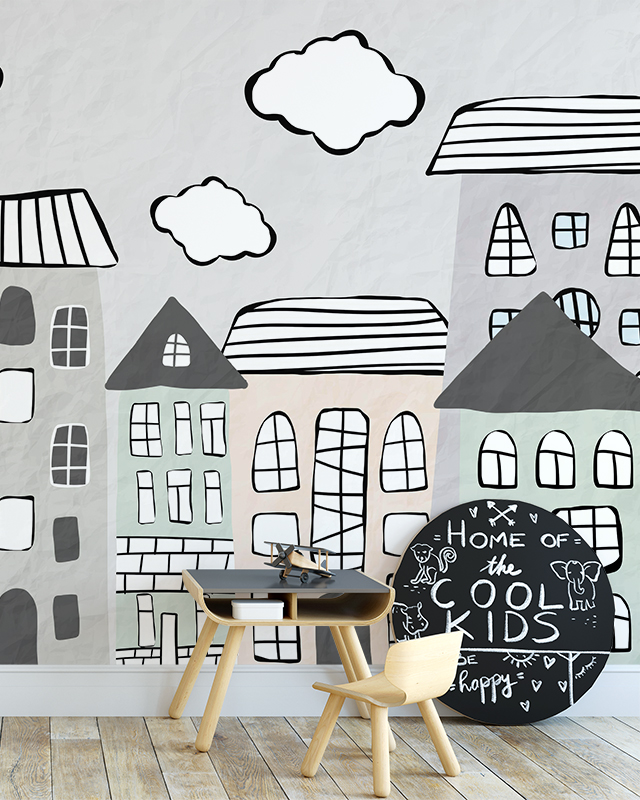 Playful cityscape wallpaper featuring pastel-colored houses and clouds, ideal for designing accent walls with teens room wallpaper.