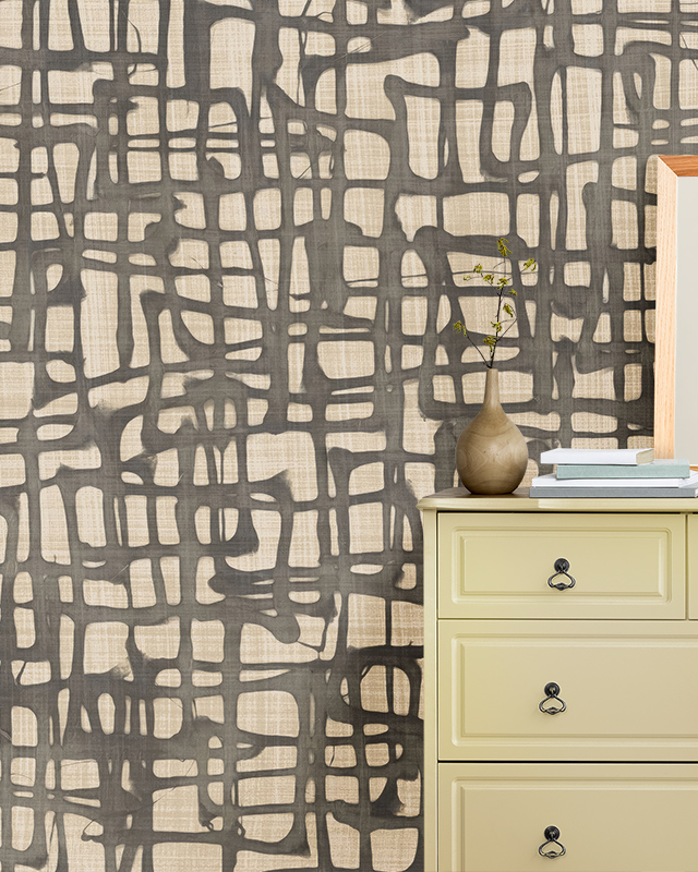 room-with-a-dresser-vase-and-books-in-front-of-benefits-of-using-beige-wallpaper-in-small-spaces-featuring-abstract-grid-patterns Room with a dresser, vase, and books in front of Benefits of using Beige Wallpaper in Small Spaces featuring abstract grid patterns.