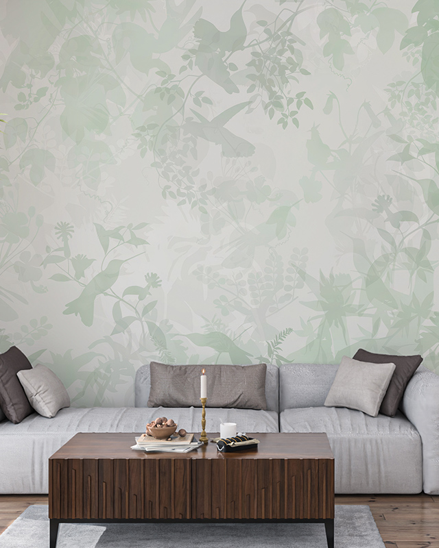 soft-green-botanical-wallpaper-with-leaf-and-bird-patterns-behind-a-grey-sofa-ideal-wallpaper-for-small-offices Soft green botanical wallpaper with leaf and bird patterns behind a grey sofa. Ideal wallpaper for small offices.