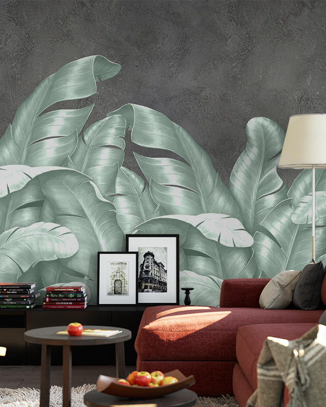 tropical-leaf-design-peel-and-stick-wallpaper-trends-behind-a-modern-red-sofa-black-console-and-framed-artwork Tropical leaf design Peel and Stick Wallpaper trends behind a modern red sofa, black console, and framed artwork.