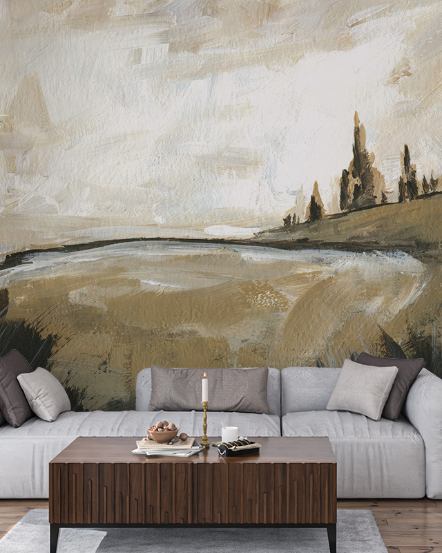 vintage-wallpapers-for-large-spaces-featuring-a-serene-landscape-painting-with-muted-tones-behind-a-gray-sofa-and-wooden-table Vintage wallpapers for large spaces featuring a serene landscape painting with muted tones, behind a gray sofa and wooden table.