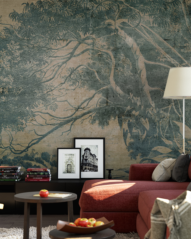 vintage-wallpapers-for-large-spaces-showcasing-a-detailed-tree-illustration-with-a-red-couch-and-framed-pictures-in-front Vintage wallpapers for large spaces showcasing a detailed tree illustration, with a red couch and framed pictures in front.