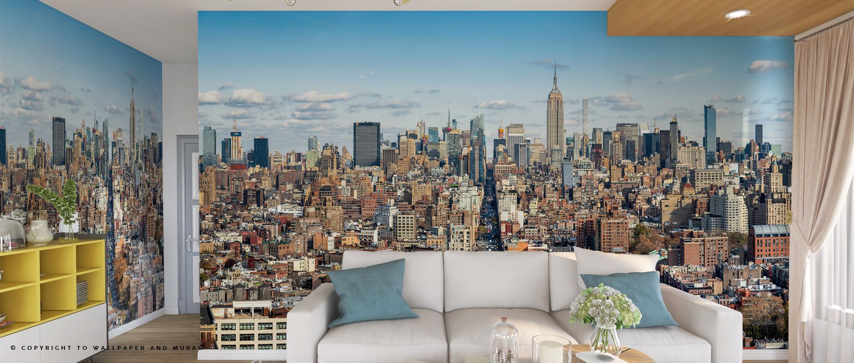 A large city skyline mural covers the wall behind a white sofa with blue cushions, showcasing urban wallpaper for different room types.