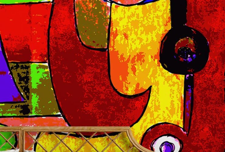 Bedroom with abstract art-inspired bright wallpaper trends featuring bold, vibrant colors and geometric shapes.