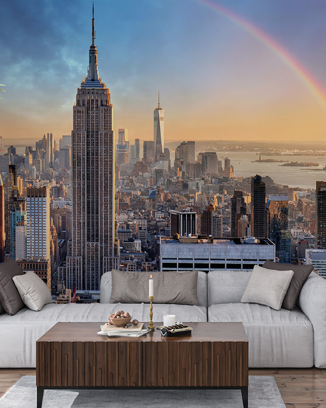 gray-sofa-and-wooden-coffee-table-in-front-of-new-york-city-skyline-mural-highlighting-bright-wallpaper-for-small-spaces Gray sofa and wooden coffee table in front of New York City skyline mural, highlighting bright wallpaper for small spaces.