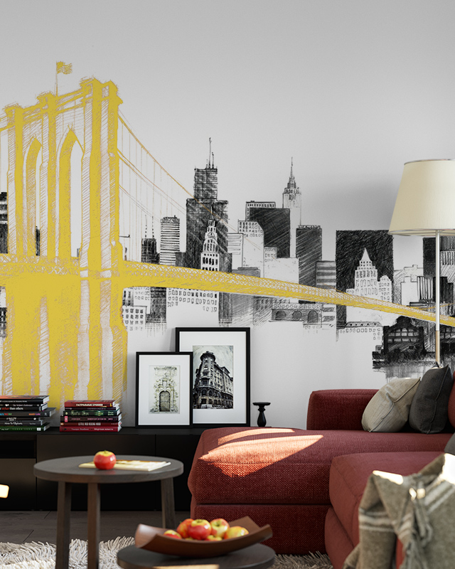 Yellow Brooklyn Bridge and black-and-white city skyline mural in a stylish room, showcasing urban wallpaper for commercial spaces.