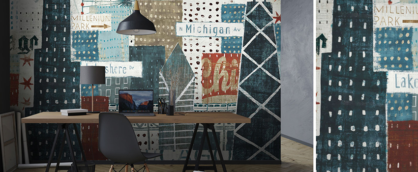 Home office with an urban-themed blue wallpaper displaying street signs and skyscrapers. 