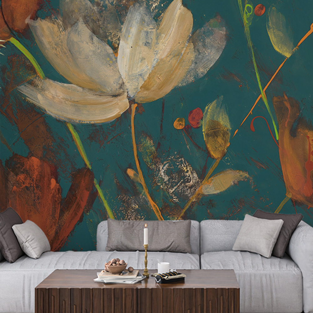 Bold floral teal wallpaper with large abstract flowers in deep, rich colors behind a neutral-toned sofa. 