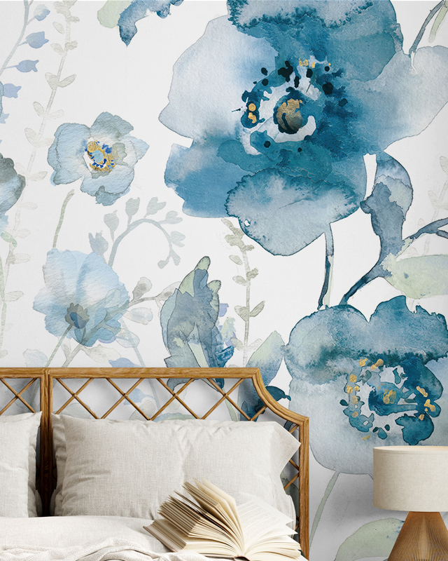 Bedroom with blue floral blue wallpaper and a wooden headboard 